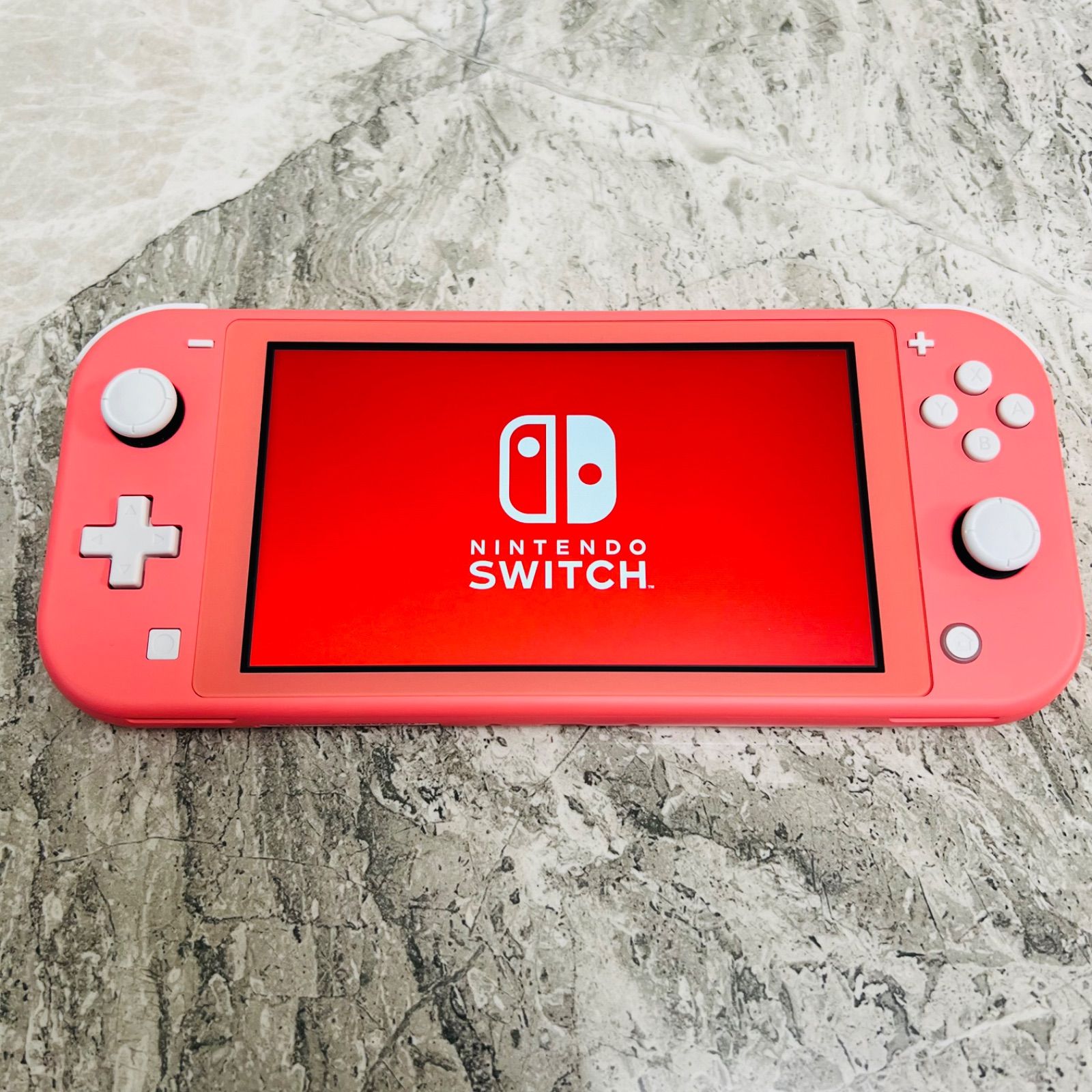 完動品】Nintendo Switch lite コーラル - メルカリ