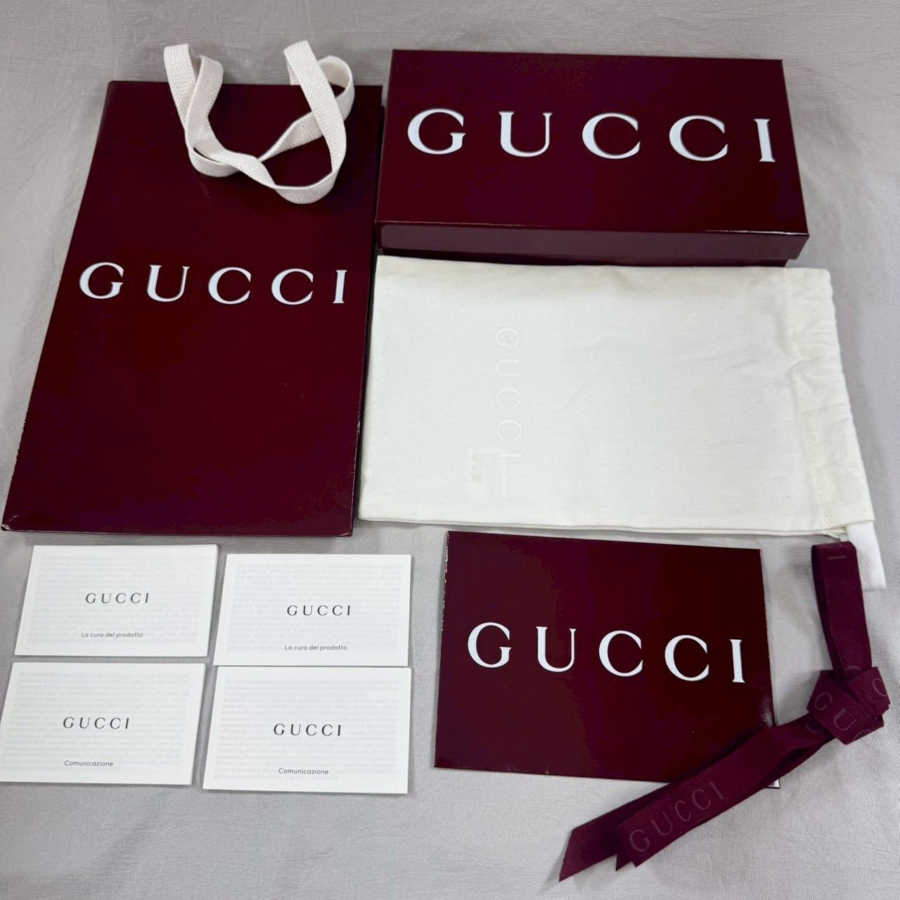 未使用・箱付】GUCCI グッチ ロゴ エンボス ジップ アラウンド 