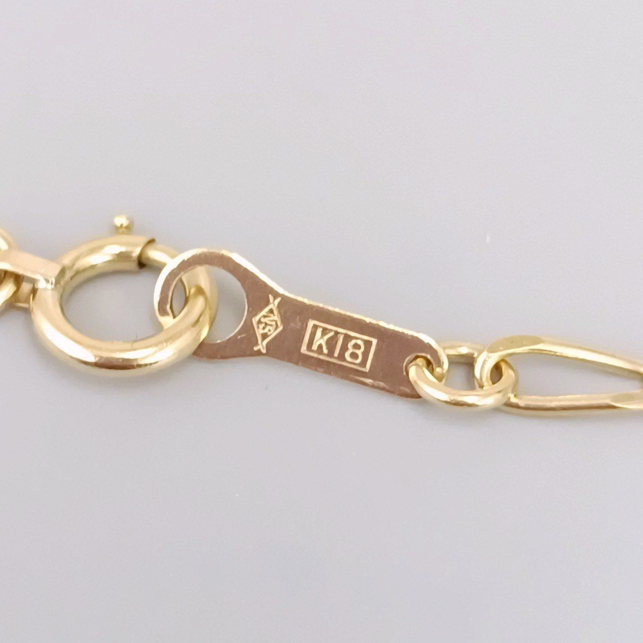 18金 K18 男女兼用 フィガロチェーンブレス 4.28g 19㎝ Z697 - メルカリ