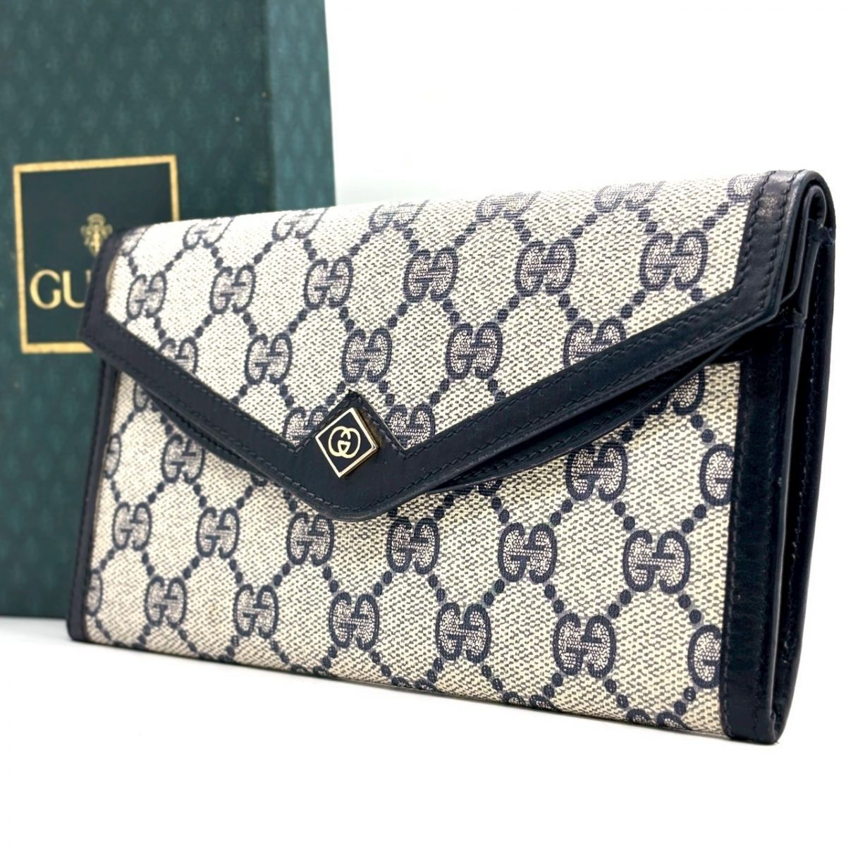 静謐に刻む伝統】 GUCCI 長財布 GGスプリーム レター型 ダブルフラップ 
