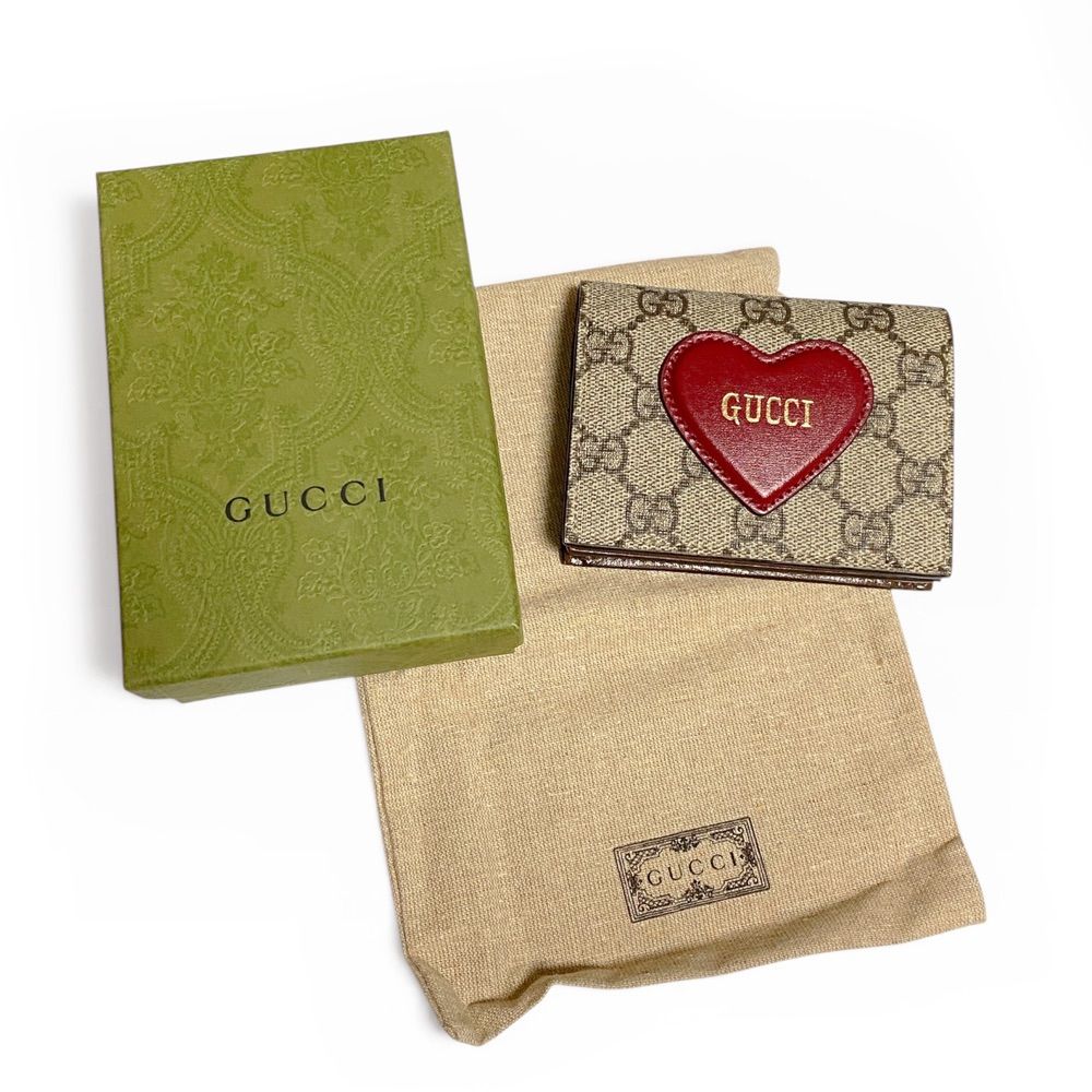 新品・未使用品】グッチ GUCCI GGスプリーム 二つ折り財布 ハート