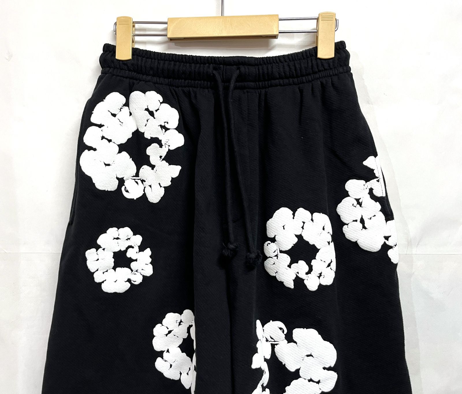 DENIM TEARS｜デニムティアーズ COTTON WREATH SWEAT SHORT PANTS