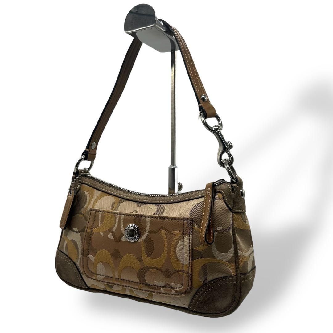 Coach Accessory Pouch Signature 2389 - メルカリ
