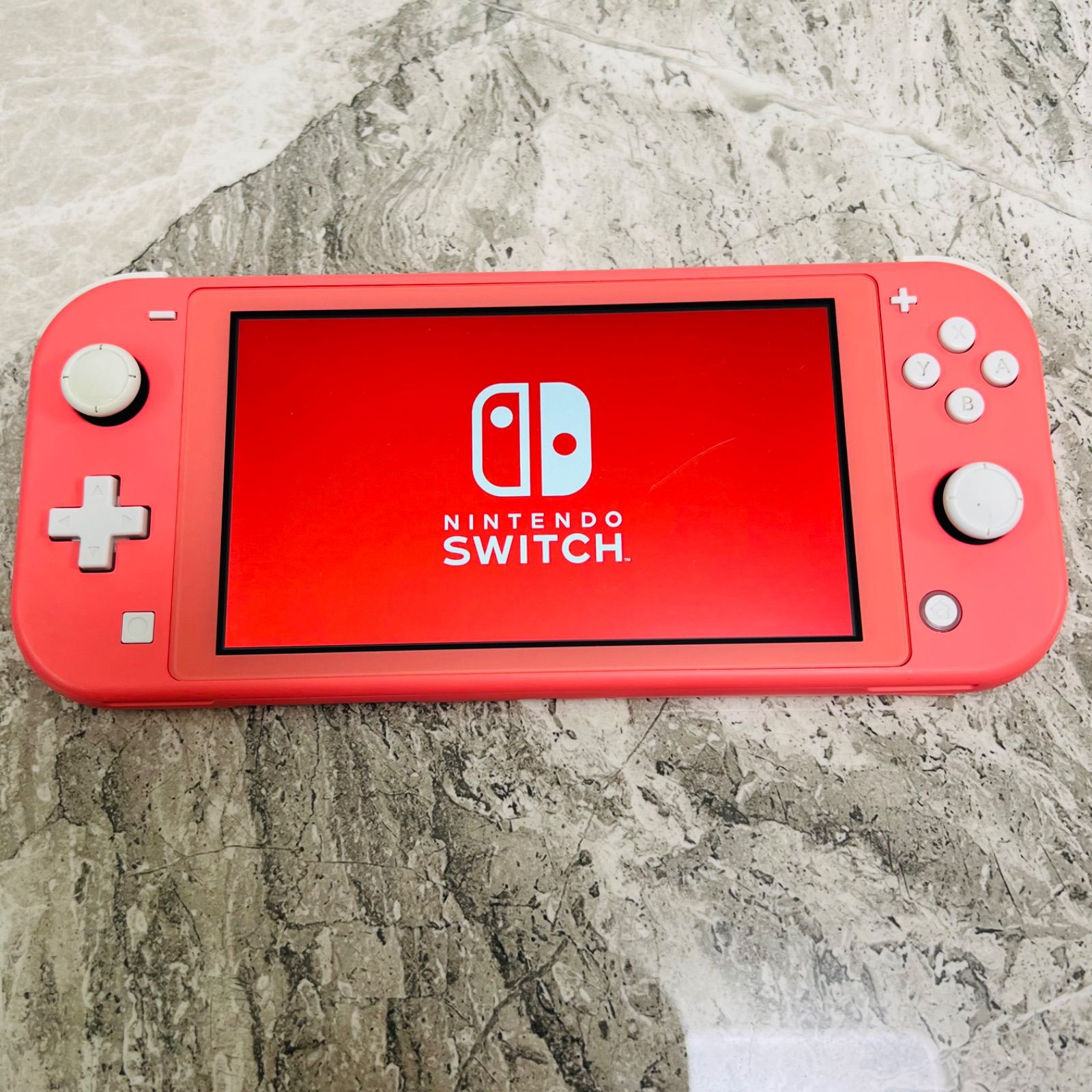 完動品】Nintendo Switch lite コーラル - メルカリ