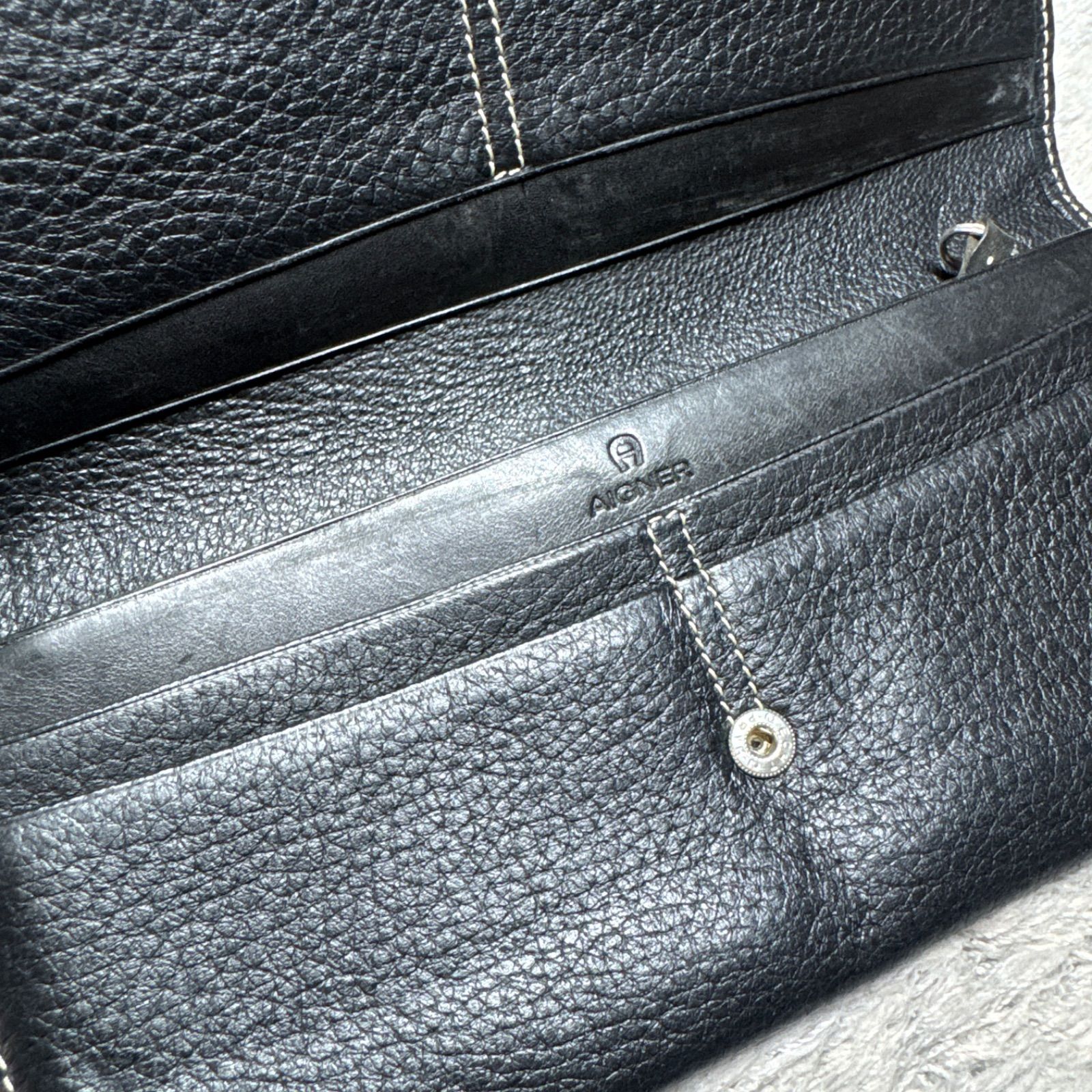 AIGNER アイグナー 長財布 フラップ式 レザー ブラック - メルカリ