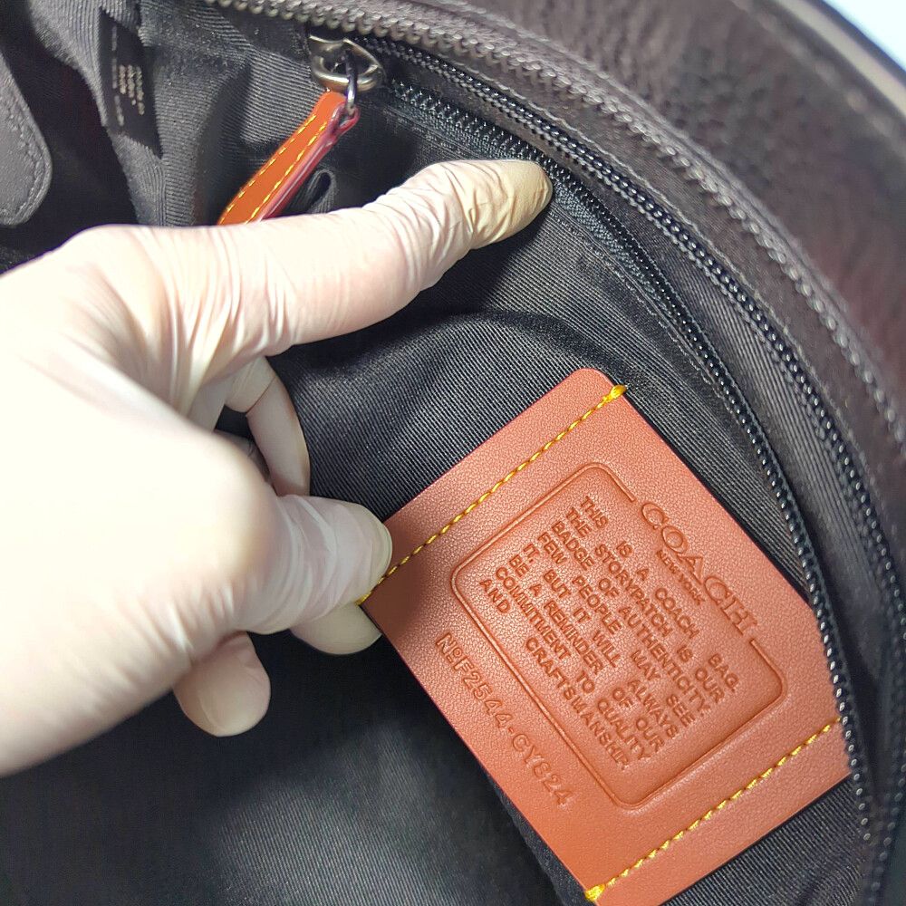 ショルダーバッグ COACH コーチ シグネチャー ディストリクトクロス 
