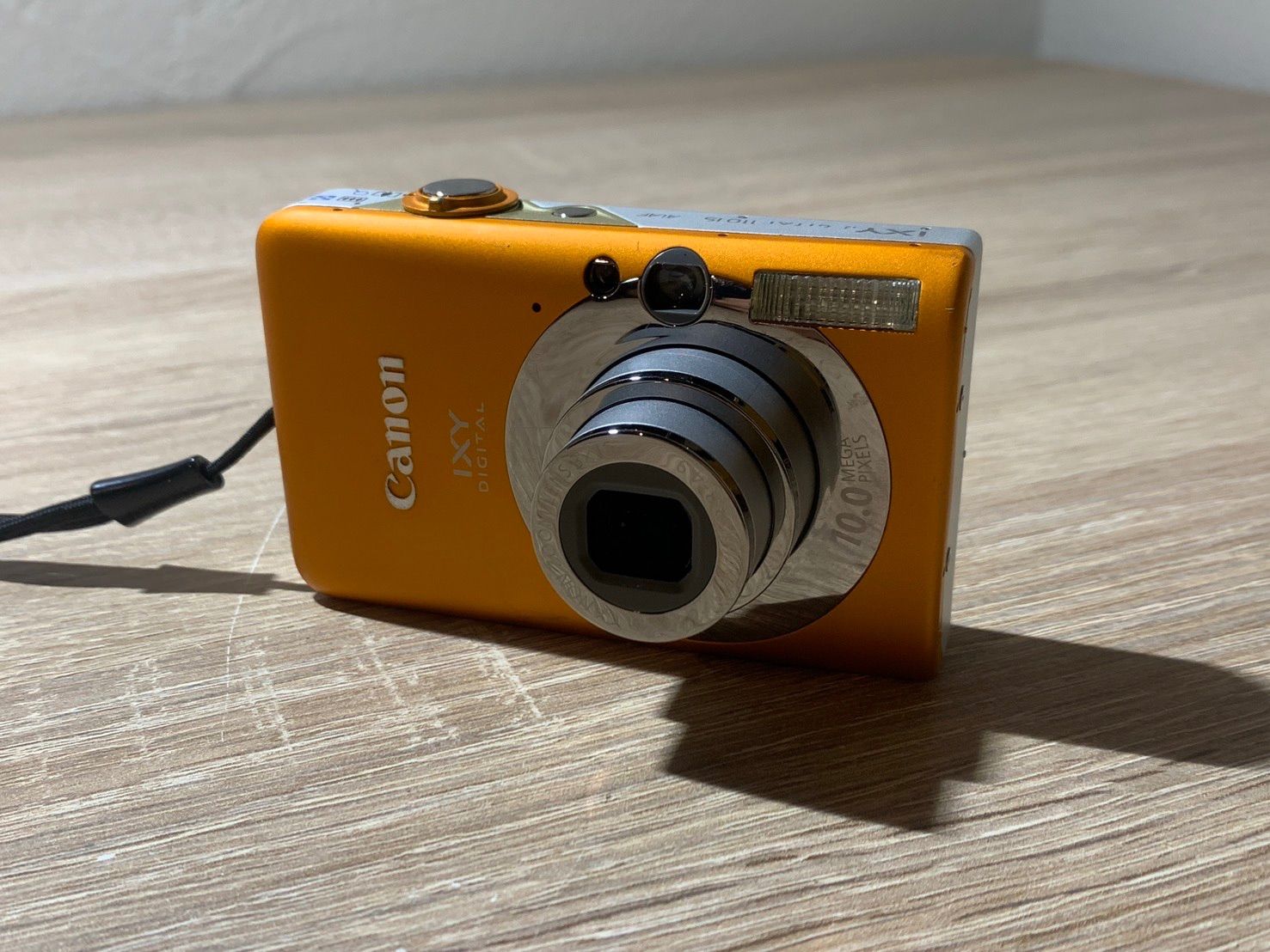 0048 Canon IXY DIGITAL 110 IS オレンジ デジカメ ジャンク品【ネ