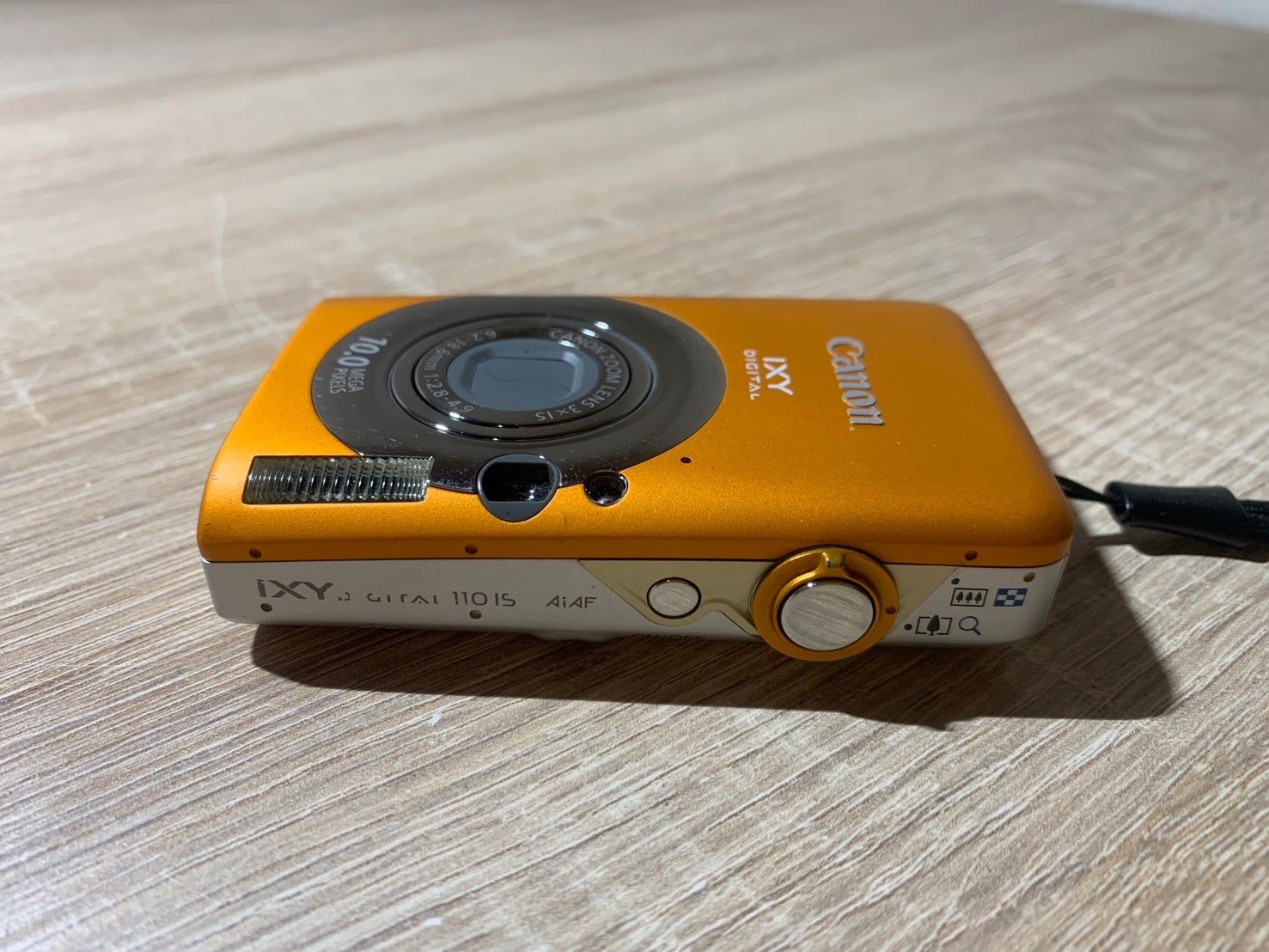 0048 Canon IXY DIGITAL 110 IS オレンジ デジカメ ジャンク品【ネ