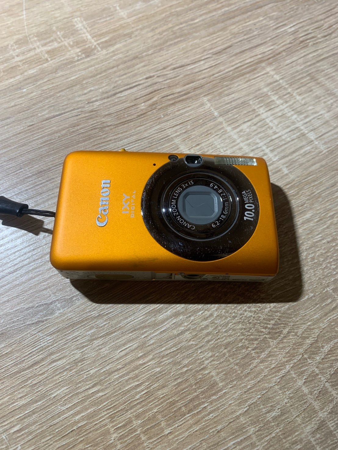 0048 Canon IXY DIGITAL 110 IS オレンジ デジカメ ジャンク品【ネ