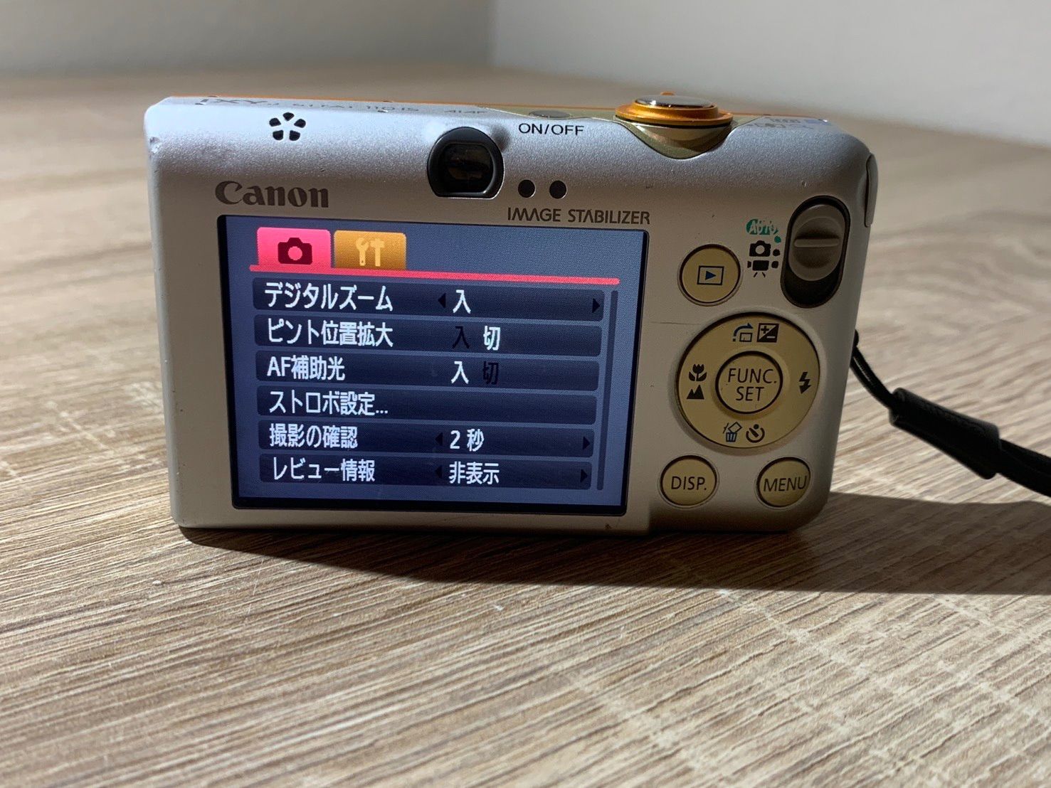 0048 Canon IXY DIGITAL 110 IS オレンジ デジカメ ジャンク品【ネ