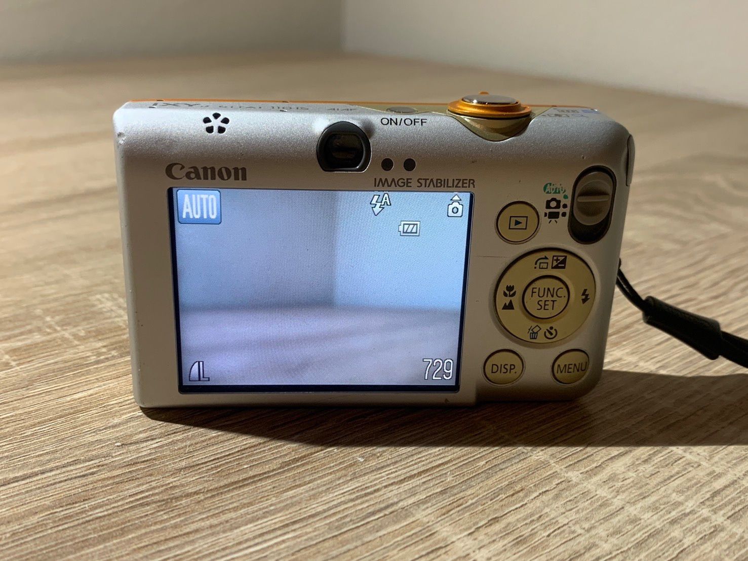 0048 Canon IXY DIGITAL 110 IS オレンジ デジカメ ジャンク品【ネ