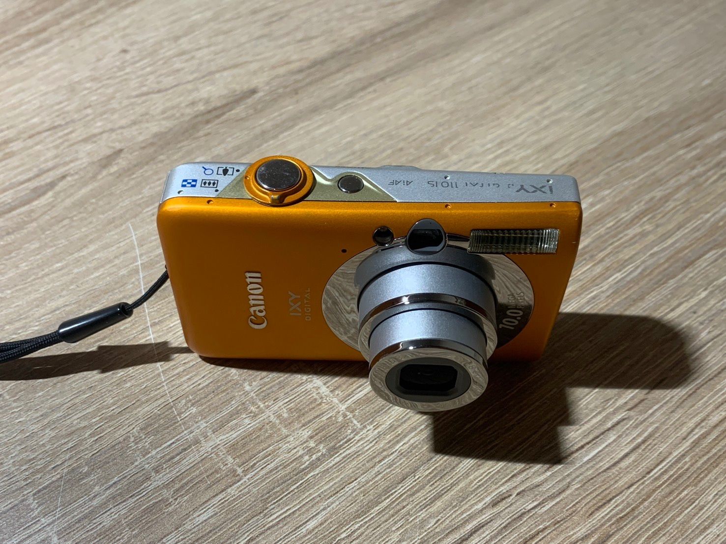 0048 Canon IXY DIGITAL 110 IS オレンジ デジカメ ジャンク品【ネ
