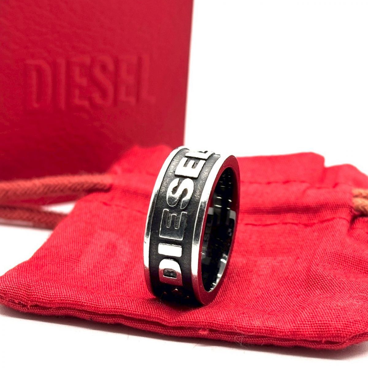 無骨に、刻む意思】 DIESEL 指輪 ロゴリング 付属品完備 シルバー ユニ 