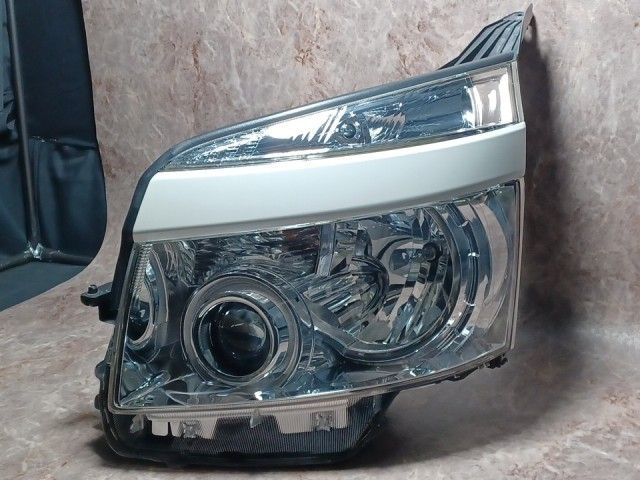 コーティング済 ヴォクシー ZRR75W 左ヘッドランプ・ヘッドライト ZS