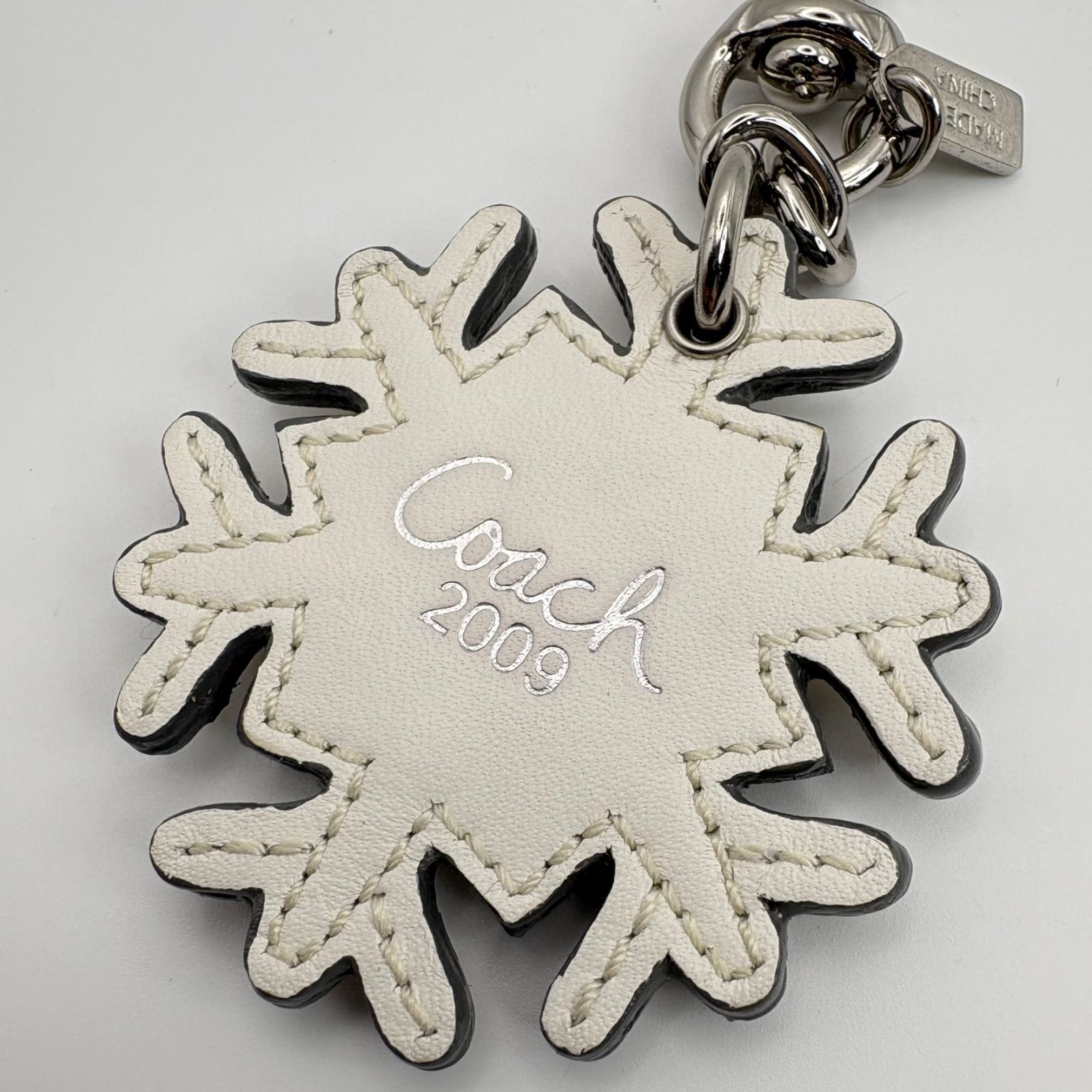COACH コーチ 雪の結晶 スノーフレーク チャーム キーホルダー
