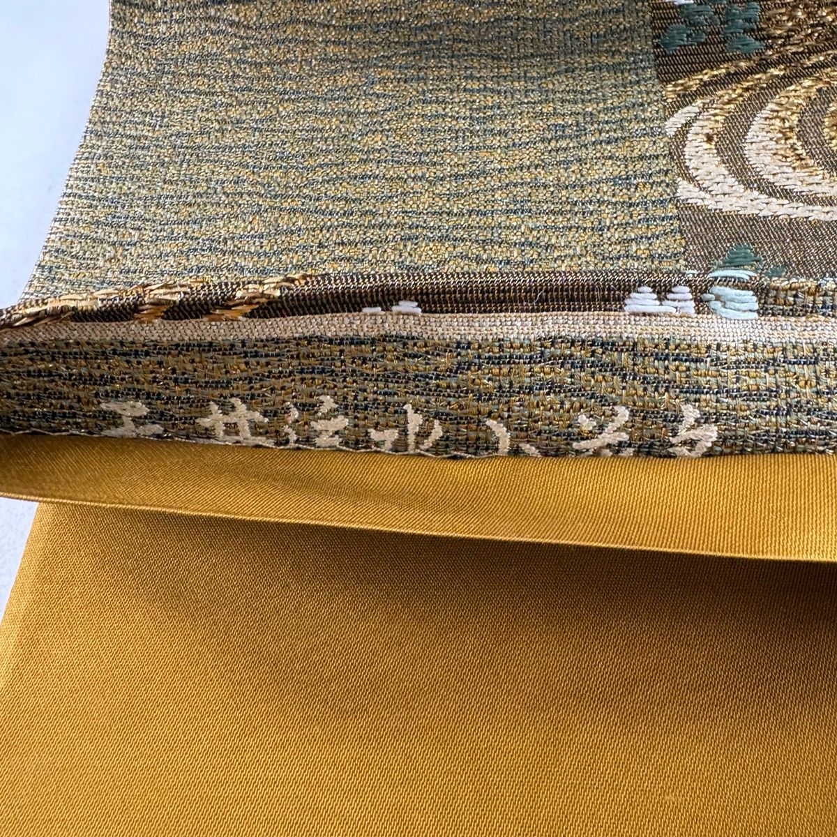 美品】 袋帯 秀品 草花 流水 金糸 箔 茶緑色 六通 正絹 【中古