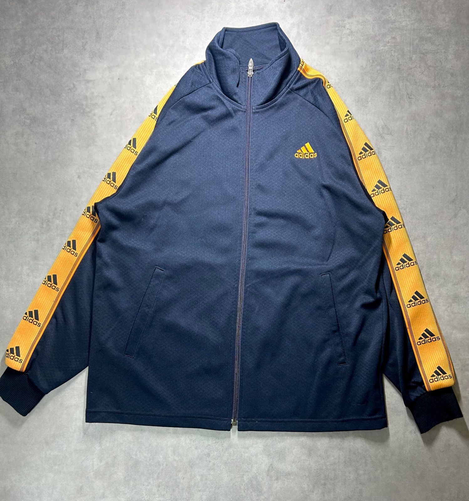 adidas アディダス トラックジャケット ジャージ 紺 オレンジ ロゴ 