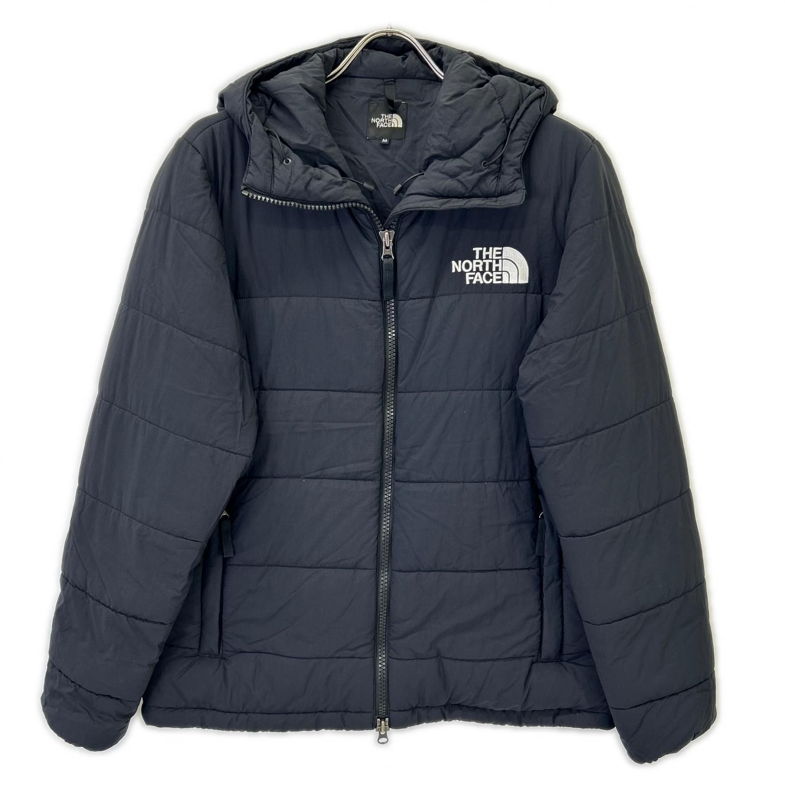 THE NORTH FACE ノースフェイス NY81831 ﾌﾞﾗｯｸ ﾄﾗﾝｺﾞﾊﾟｰｶ ﾀﾞｳﾝｼﾞｬｹｯﾄ M