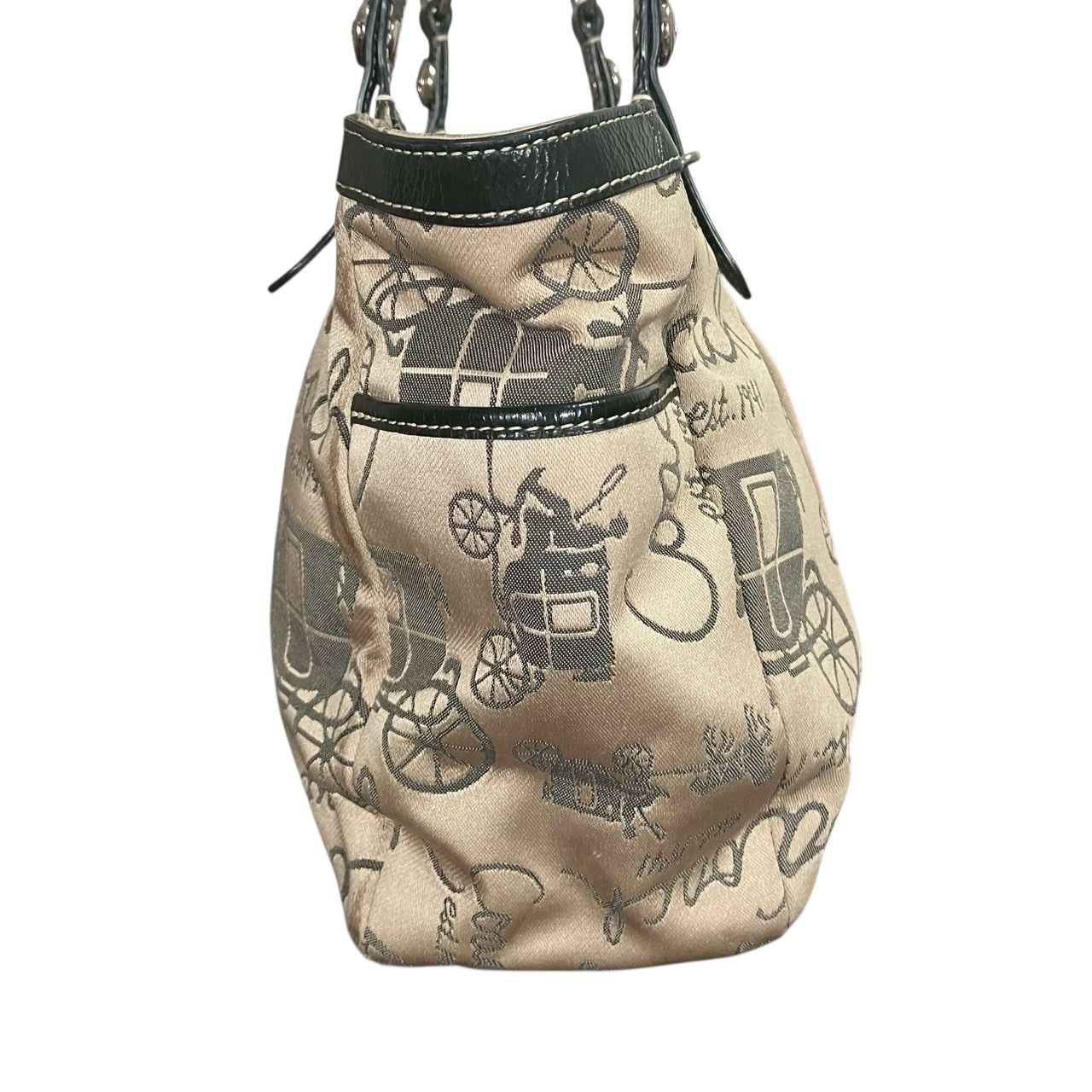 COACH カモフラ　キャンバス　トートバッグ　ホースアンドキャリッジ COACH（コーチ）の「100 パーセント リサイクル キャンバス トート 42
