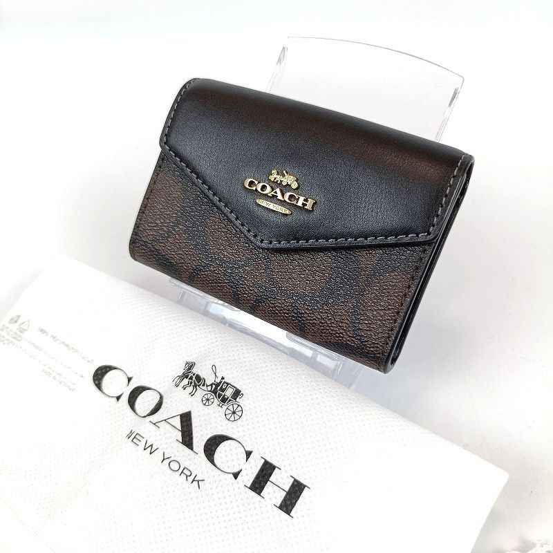 未使用 COACH コーチ カードケース 名刺入れ ブラック×ブラウン シグネチャー コーテッド キャンバス 保存袋 スナップ開閉 メンズ レディース ブランド