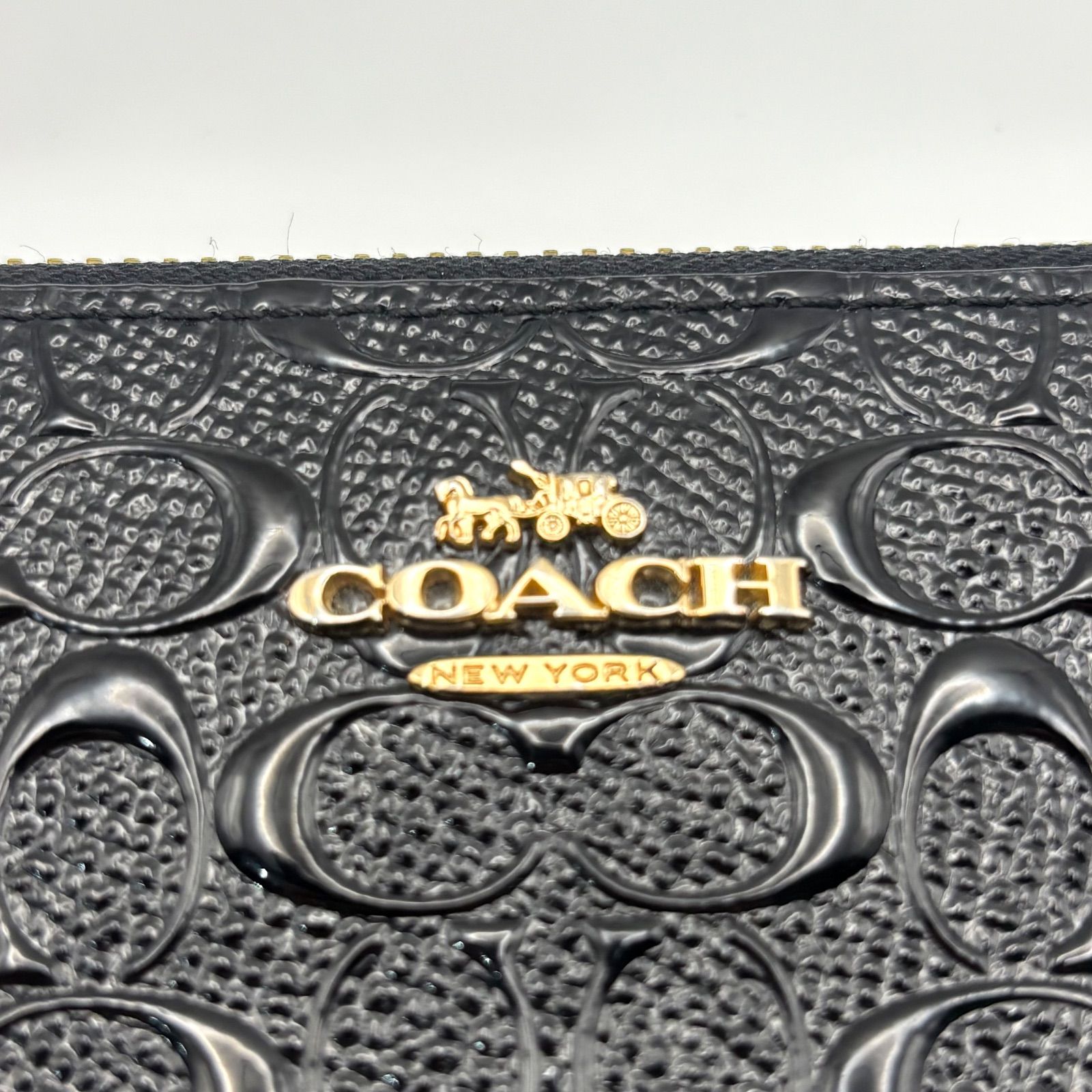 coach コーチ 長財布 ラウンドファスナー エナメル エンボス 黒 