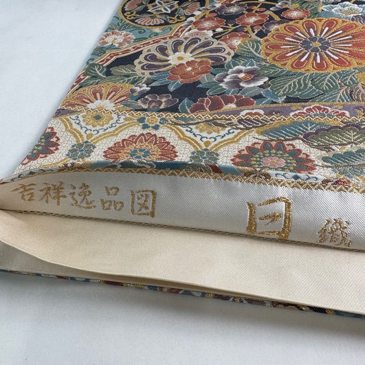 美品】 袋帯 秀品 吉祥逸品図 菊 笠松 金糸 箔 水色 お太鼓柄 正絹