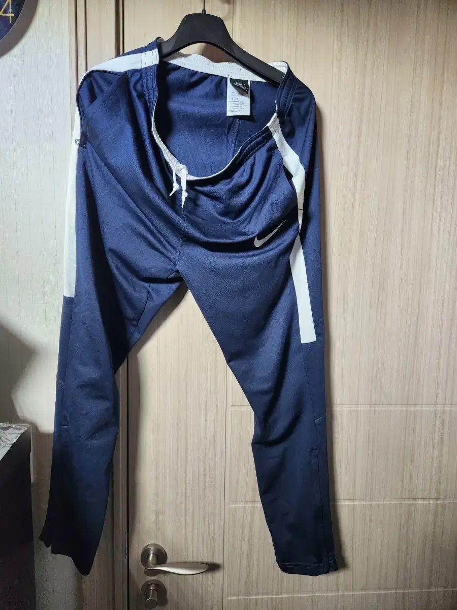 ナイキ ネイビー トレーナー ズボン 100