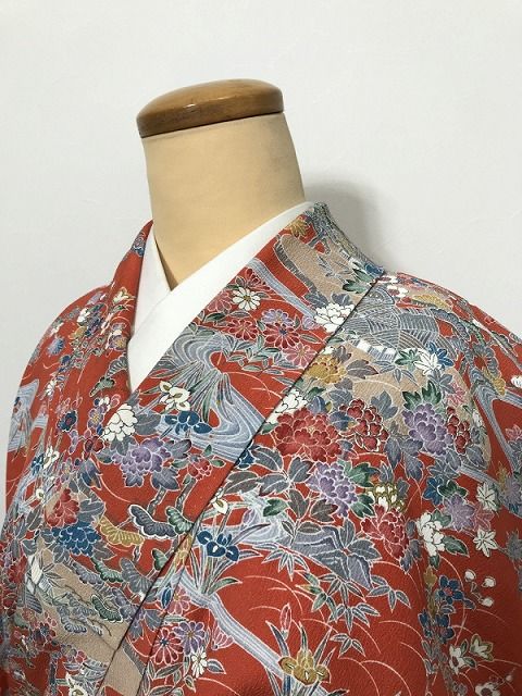 【中古】Sサイズ 小紋 化繊 橙色地に御所解き模様