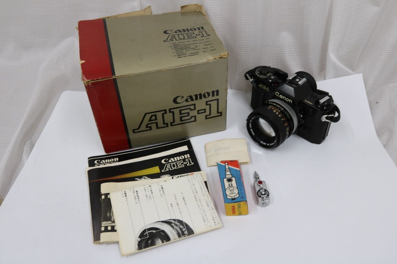 【返品保証】 【元箱付き】キャノン Canon AE-1 ブラック FD 50mm F1.4 SSC ボディレンズセット e11209