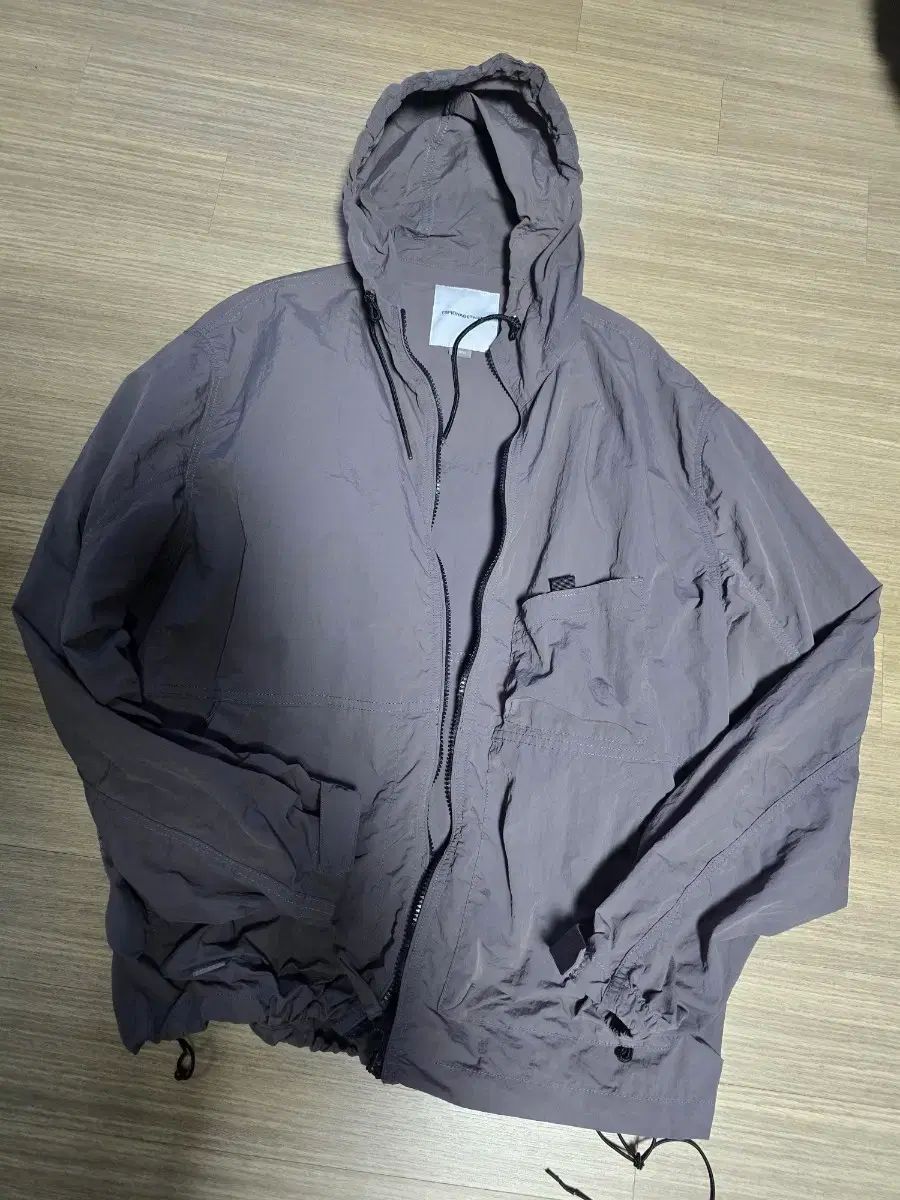 エスピオナージ フード ウィンドブレーカー large グレー
