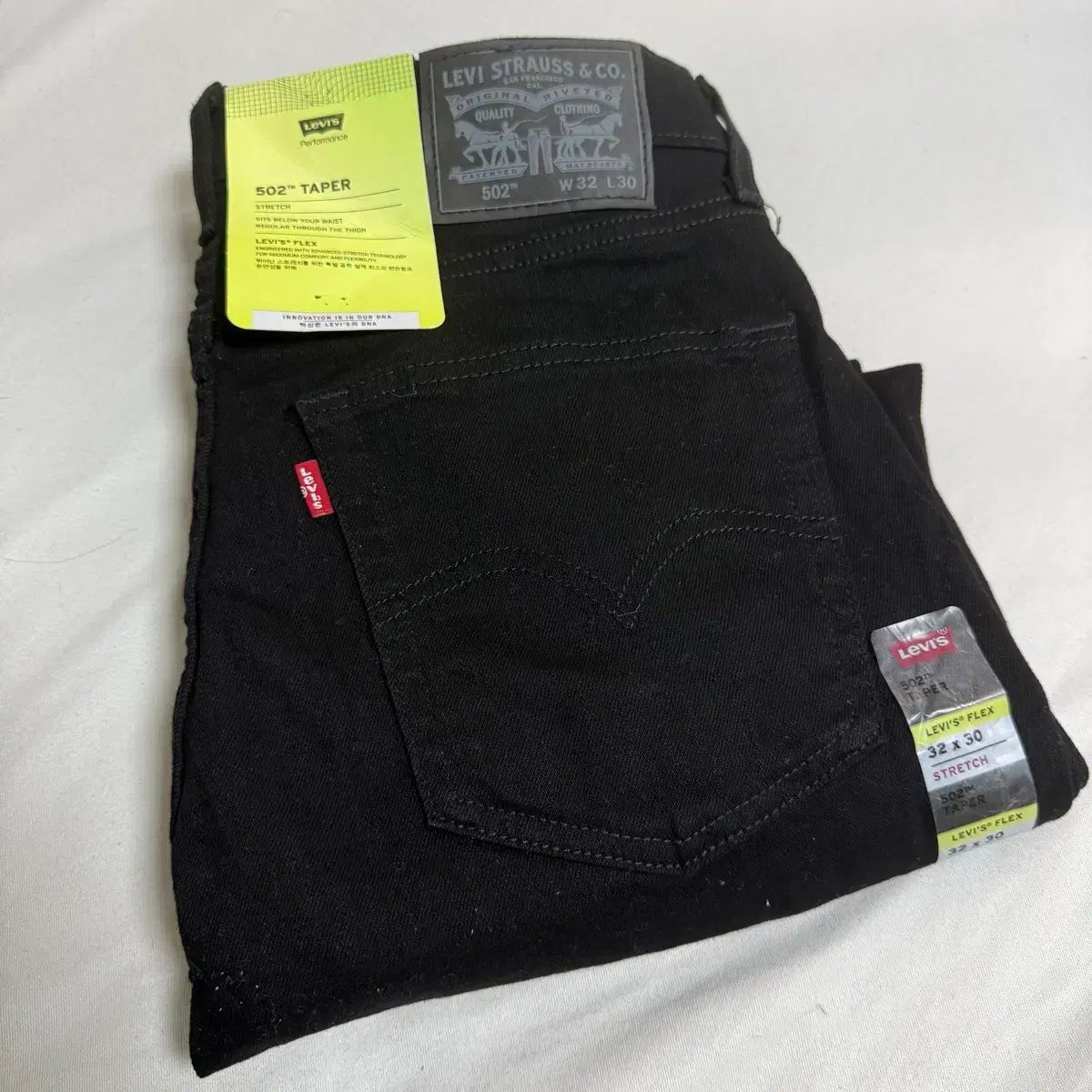 (新品)リーバイス 502 テーパー ブラックジーン 32x30