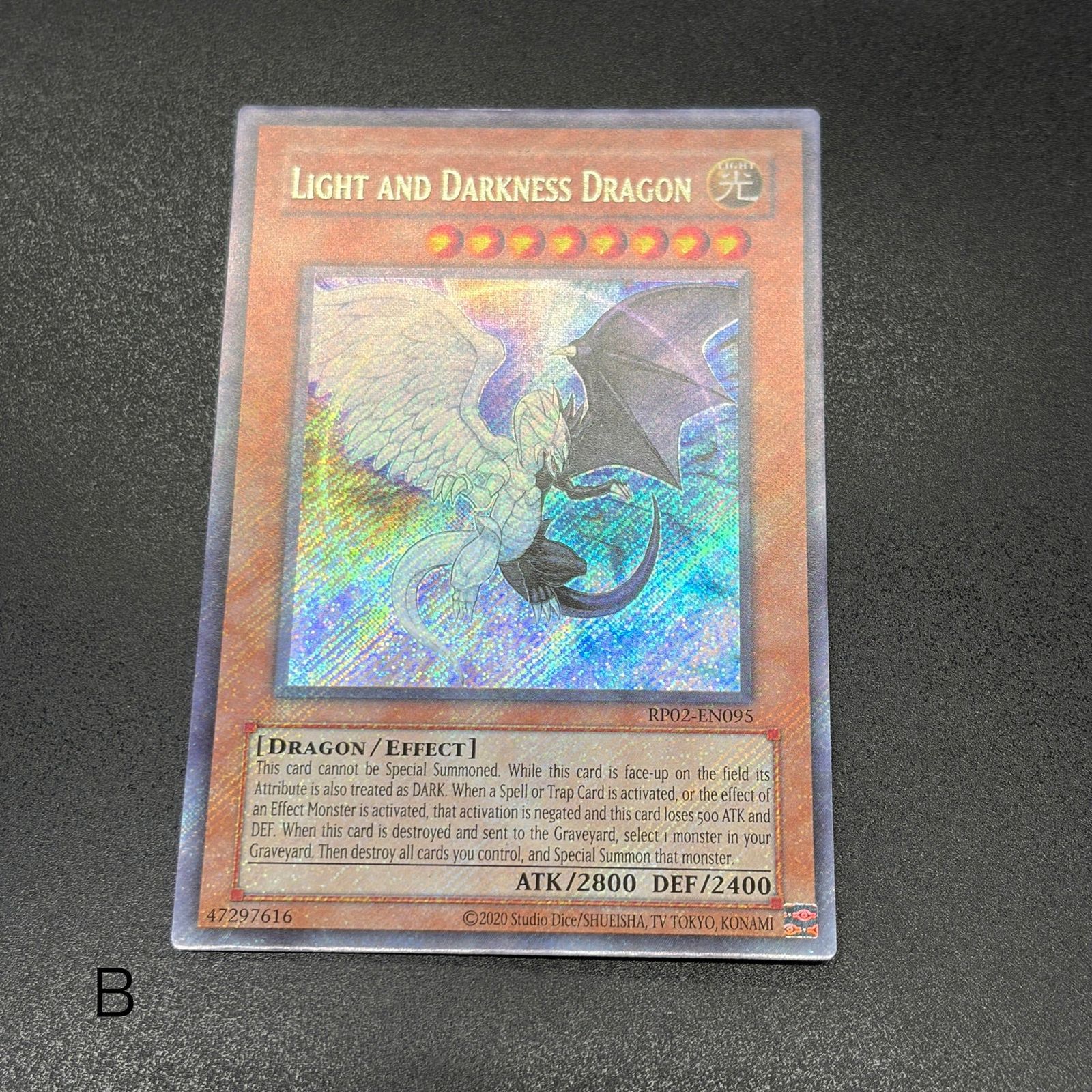 遊戯王 光と闇の竜/シークレット/英語/北米版 B - メルカリ