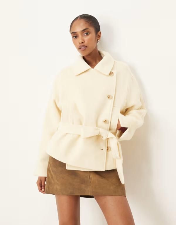 エイソス レディース アウター ジャケット・ブルゾン ウール コート ASOS DESIGN wool blend short trench coat with low belt in buttermilk Buttermilk