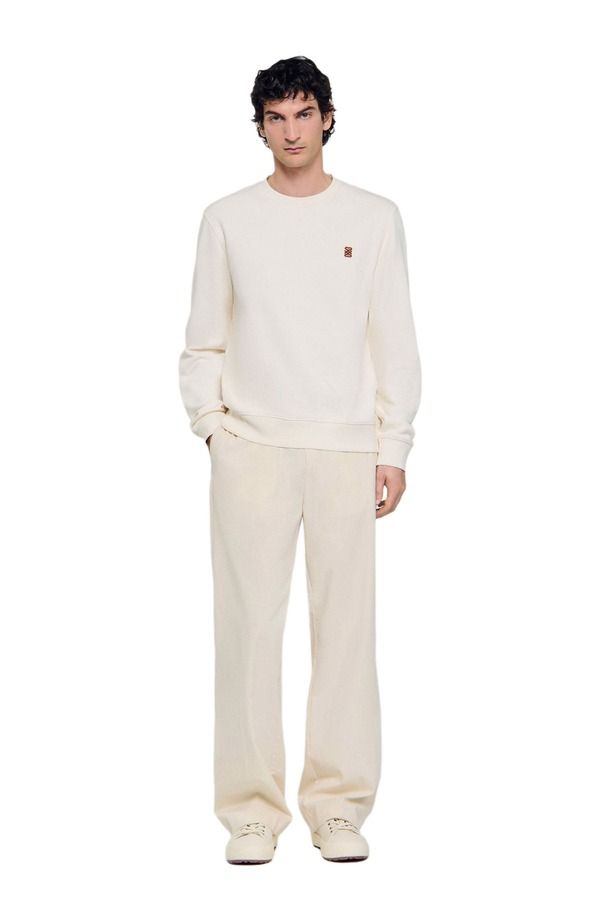 サンドロ メンズ アウター パーカー・スウェット シャツ レザー SANDROversized sweatshirt with leather patch Butter Cream クリーム