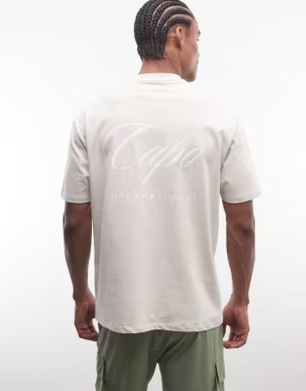 カポ メンズ トップス Tシャツ プリント ロゴ CAPO internationalogo back printshirt BEIGE ベージュ