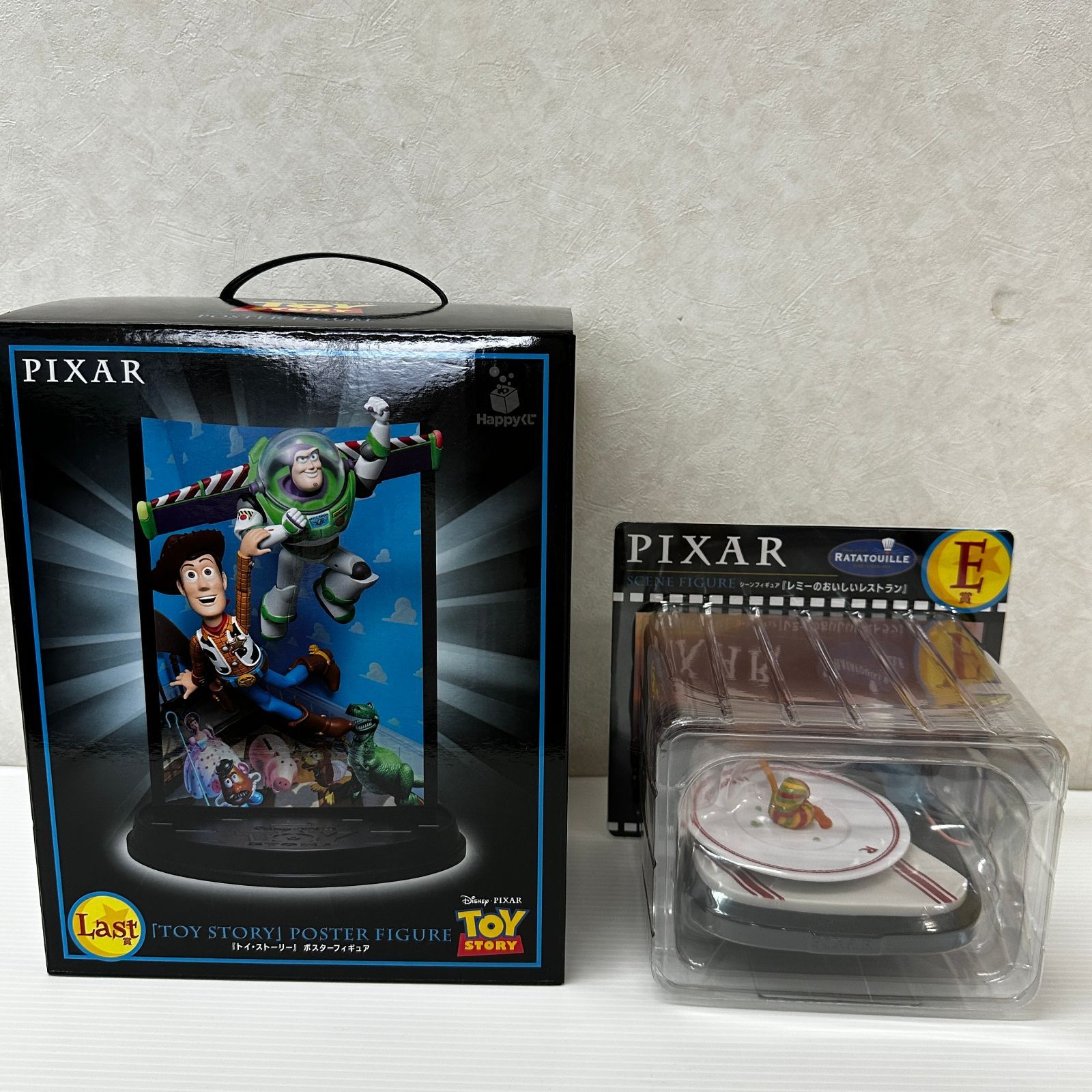 ▲ディズニー PIXAR ハッピーくじ E賞 レミーのおいしいレストラン / ラストワン賞 トイ・ストーリー ポスターフィギュア 2点セット 未開封品 smgdis096457