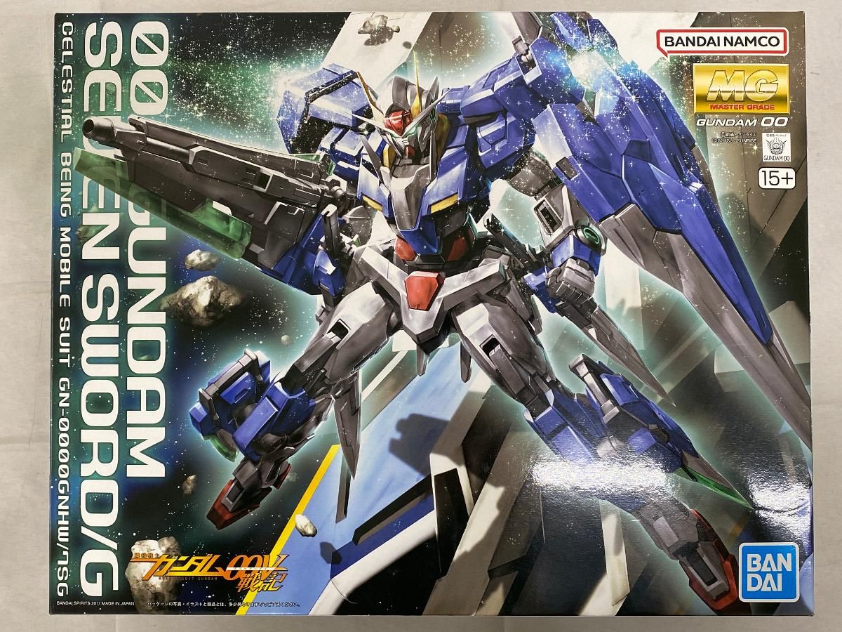 【未開封】MG 機動戦士ガンダム00V戦記 ダブルオーガンダムセブンソード/G 1/100スケール 色分け済みプラモデル
