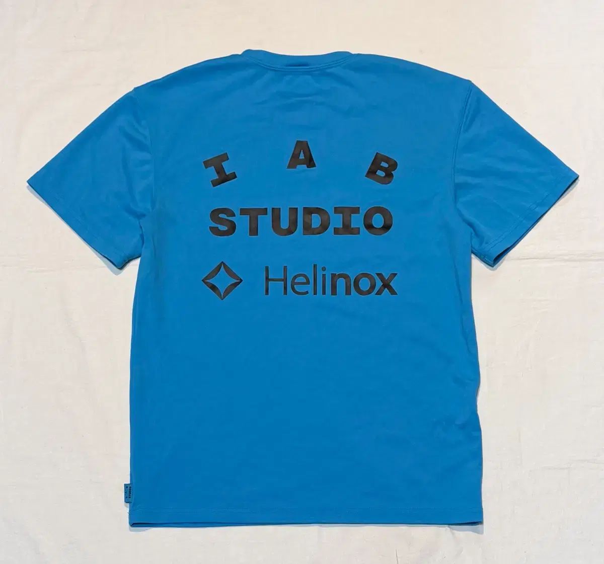 IAB Studio アイエプスタジオ X helinox(ヘリノックス) Tシャツ シアン ブルー