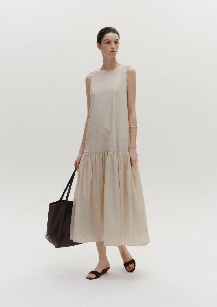 シエ ラッフルヘムドレス クリーム Fサイズ ロング丈