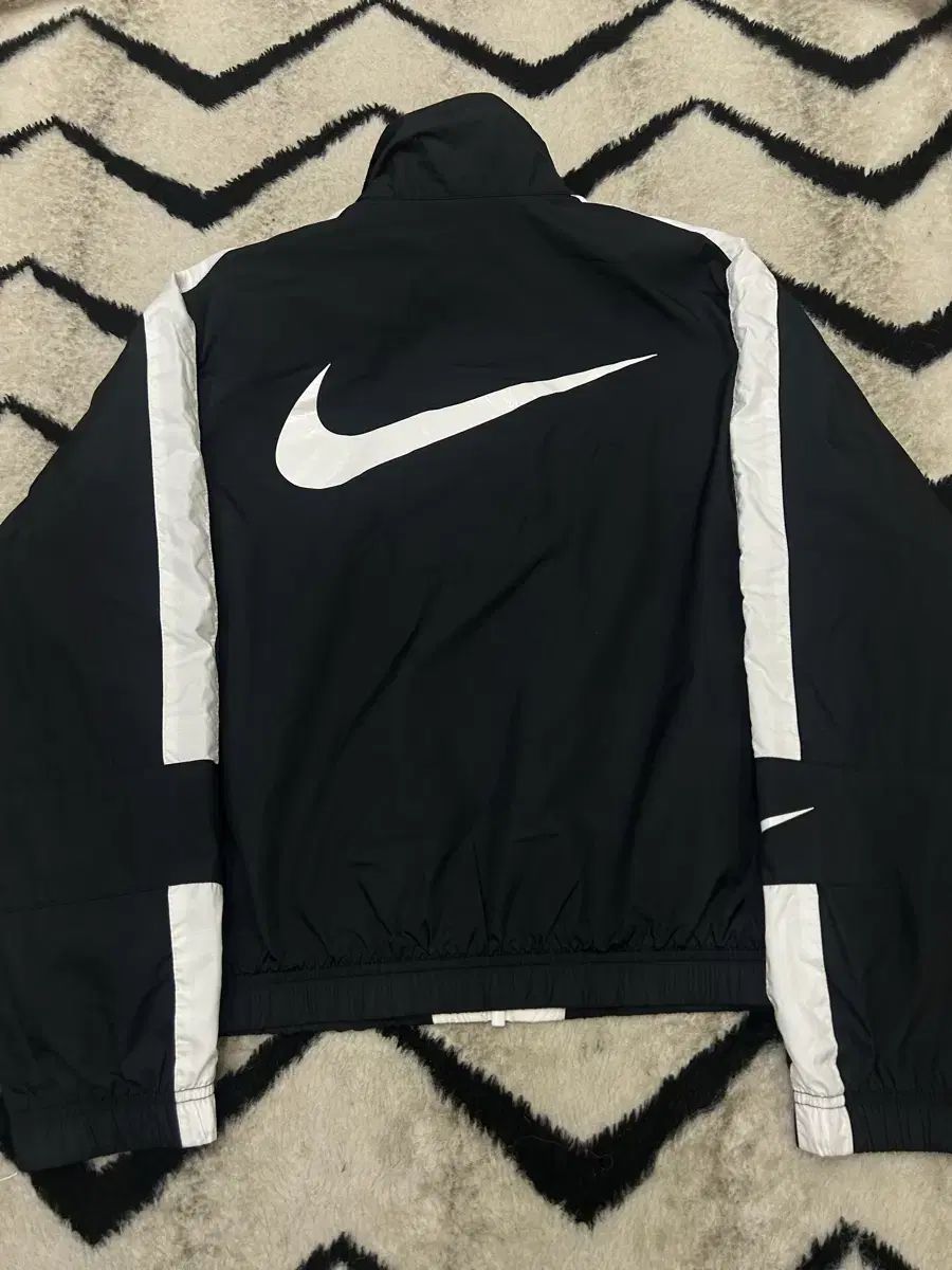 XL NIKE レペル エッセンシャル ウーブン ヴァラ막い