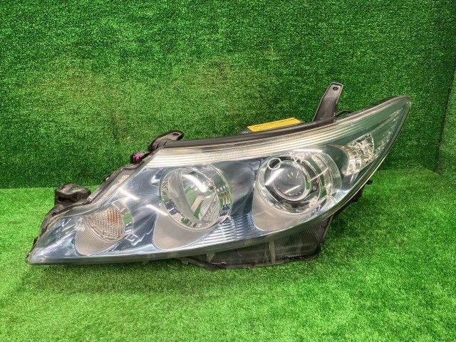 エスティマ AHR20W 左ヘッドランプ・ヘッドライト G コイト 28-212 