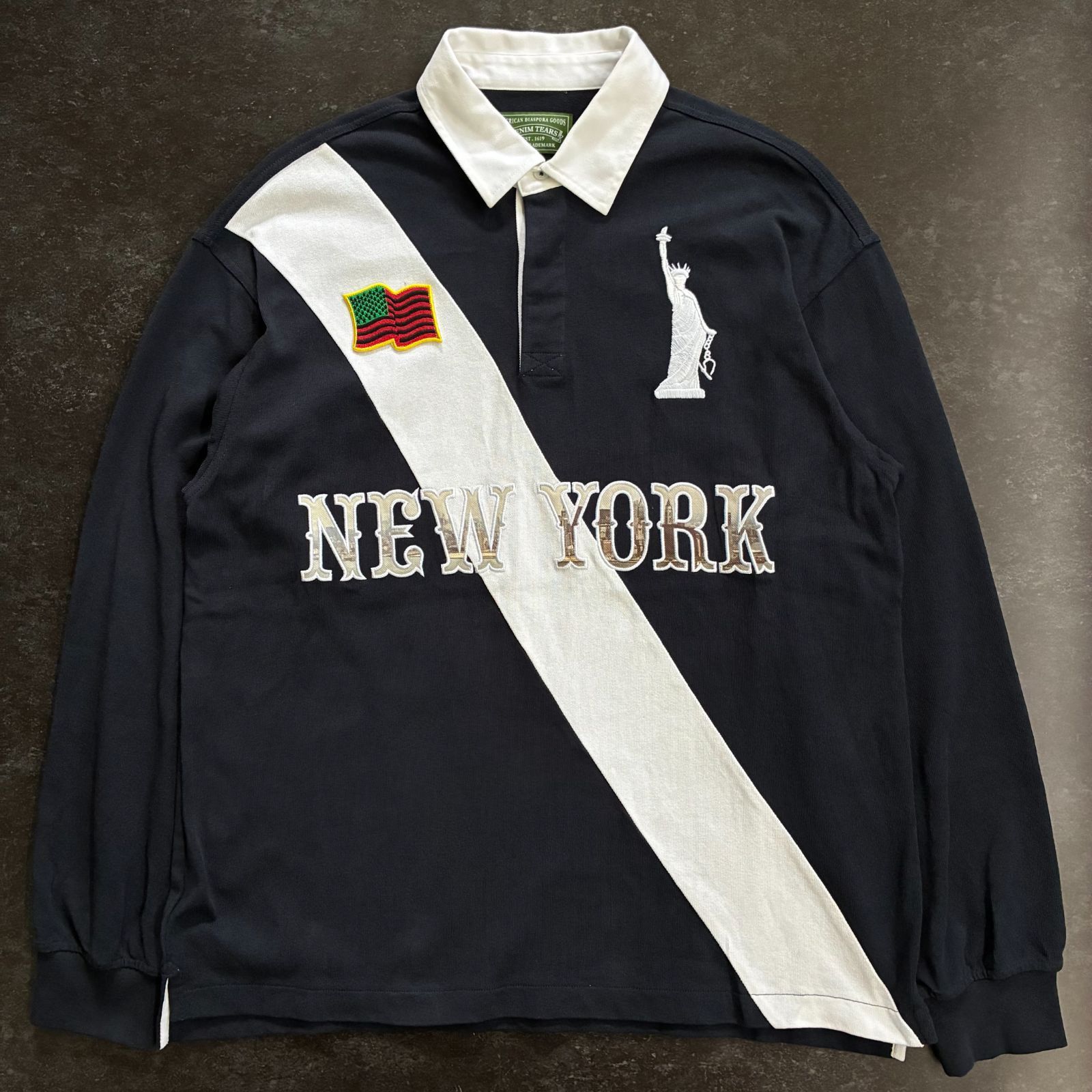 DENIM TEARS デニムティアーズ 2026SS Libertas Rugby Lady Liberty Rugby ラグビーシャツ 古着 若干ダメージ