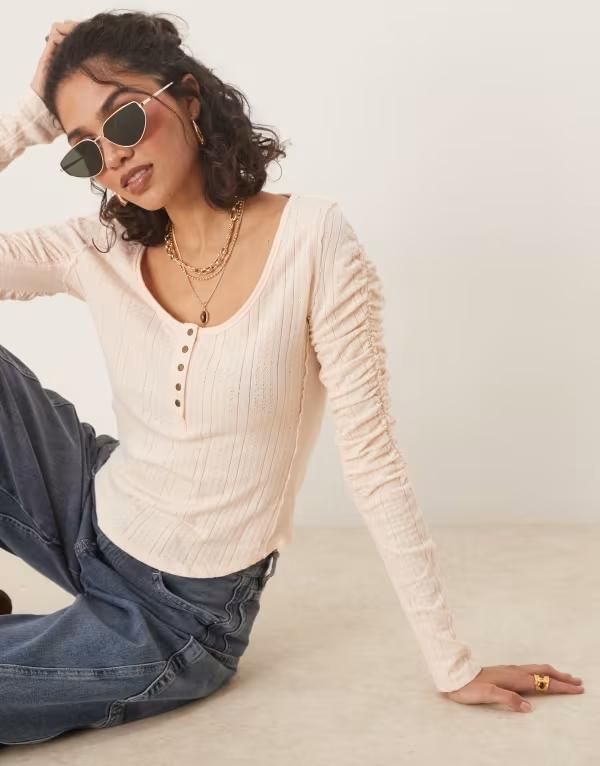 フリーピープル レディース アウター カーディガン リブ Free People hope henley ribbed long sleeve top in light PINK ピンク