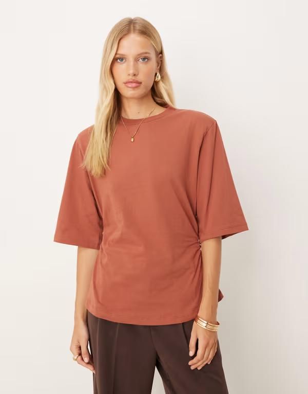 エイソス レディース トップス Tシャツ ASOS DESIGN cinched tee with shoulder pads in rust ラスト