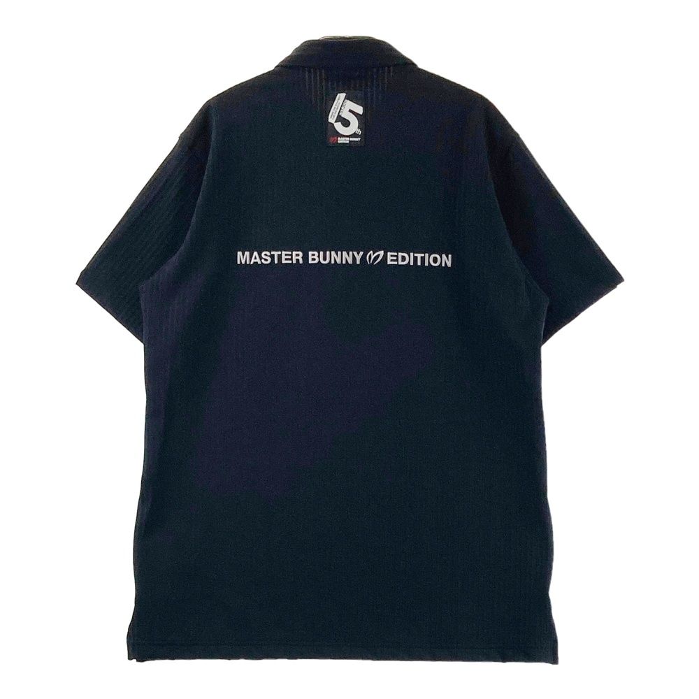 サイズ：6 MASTER BUNNY EDITION マスターバニーエディション 15周年 2025年モデル 半袖ポロシャツ ブラック系 [240101674354] ゴルフウェア メンズ ストスト