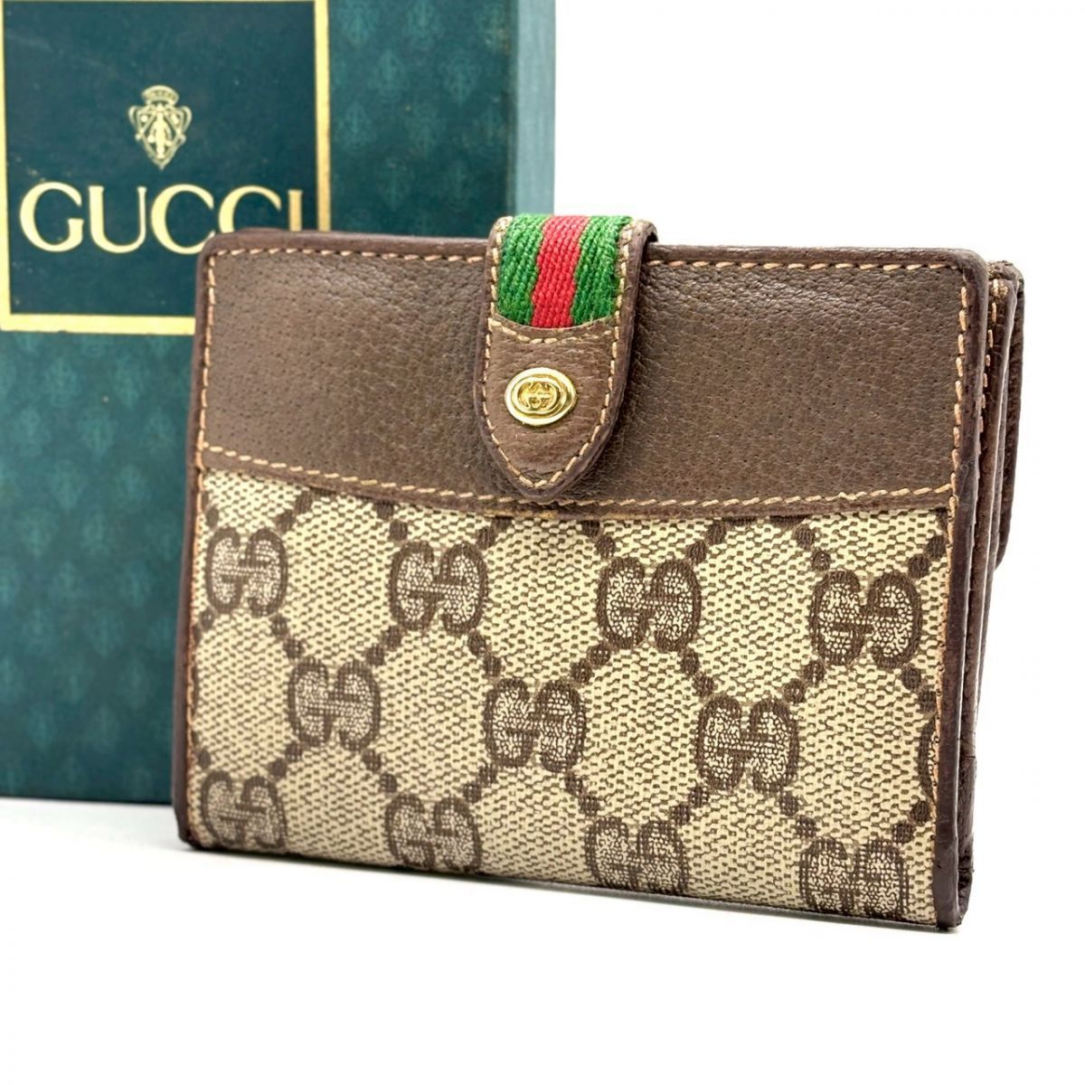 静かに惹かれる】 GUCCI 二つ折り財布 GGスプリーム シェリーライン