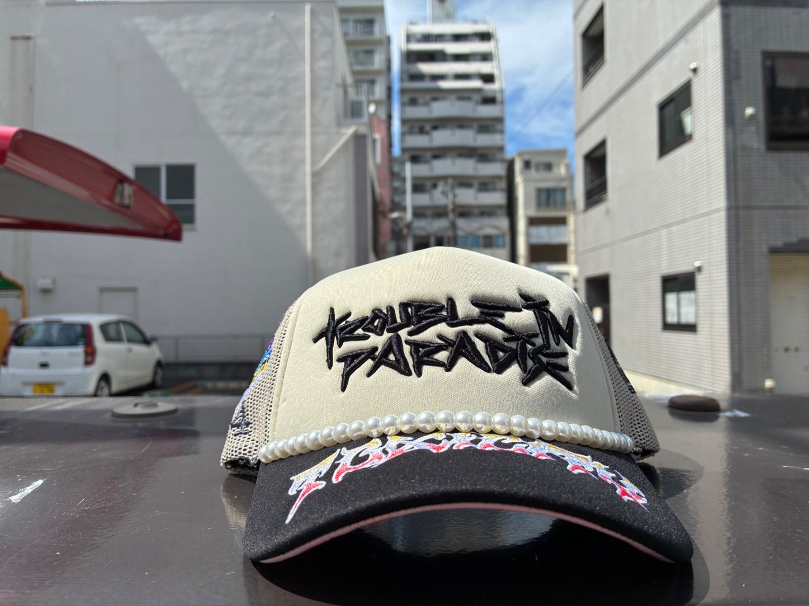 TOXICITY×DISMISSED TROUBLE IN PARADISE TRUCK HAT -OFF WHITE-