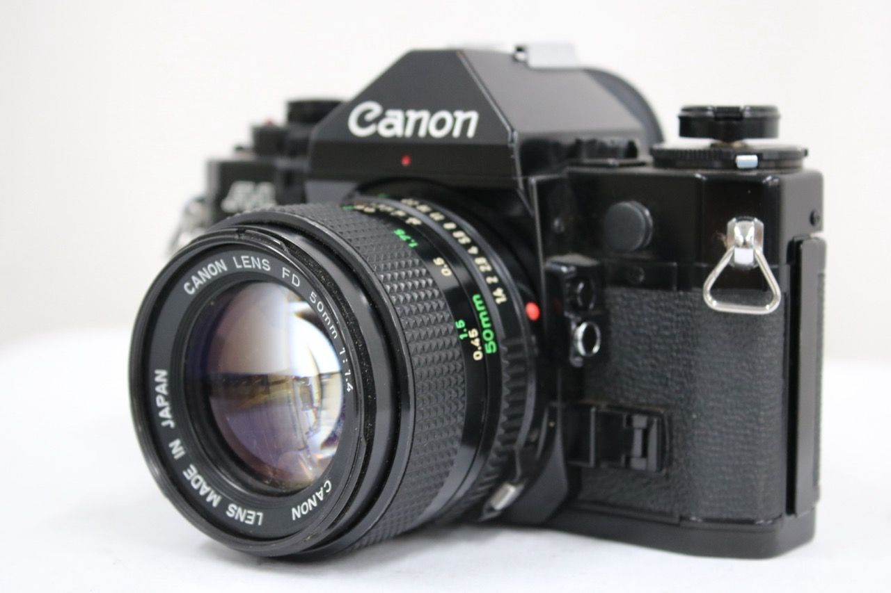 【返品保証】 キャノン Canon A-1 ブラック New FD 50mm F1.4 ボディレンズセット e11660