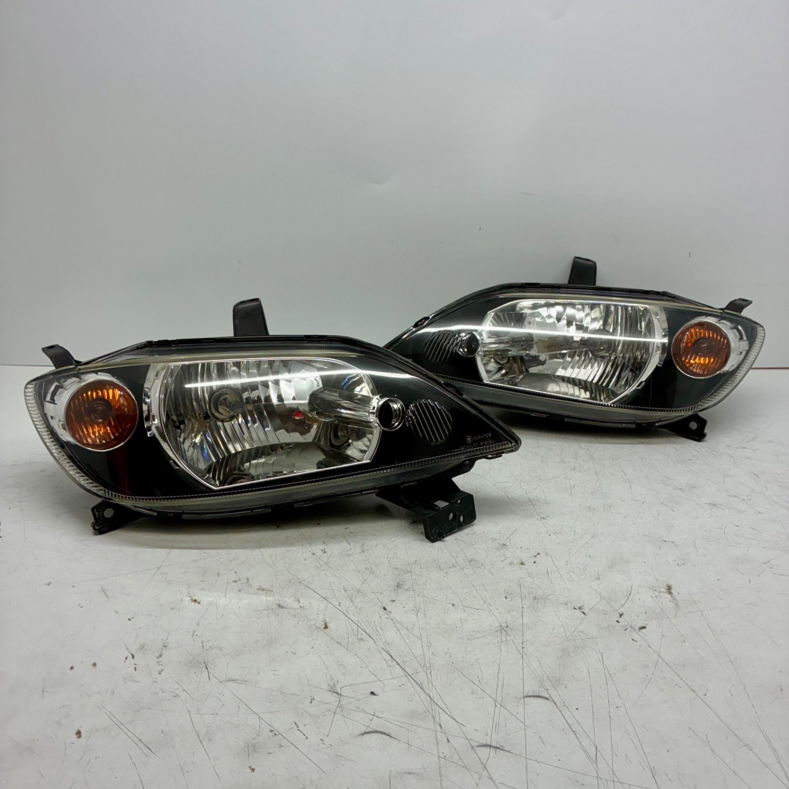 良品【コーティング済】マツダ DY3W デミオ ヘッドライト ランプ レンズ 左右セット LR ハロゲン レベ無 STANLEY P1919 HCR-126 P80512