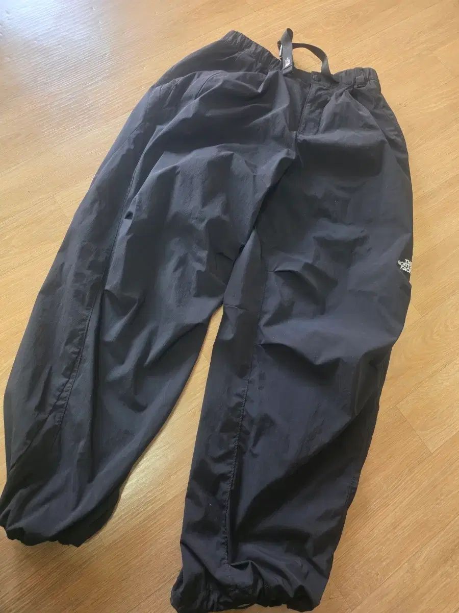 THE NORTH FACE ブラック ウィンドブレーカー ズボン